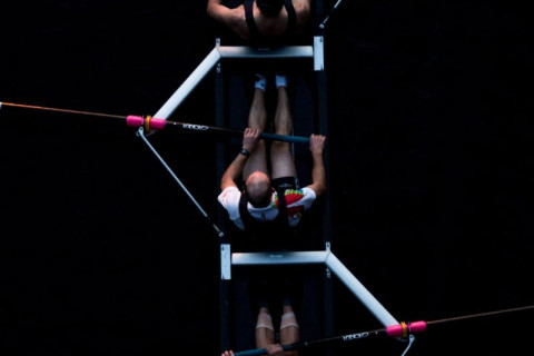 Photo of a rowing team working in harmony.